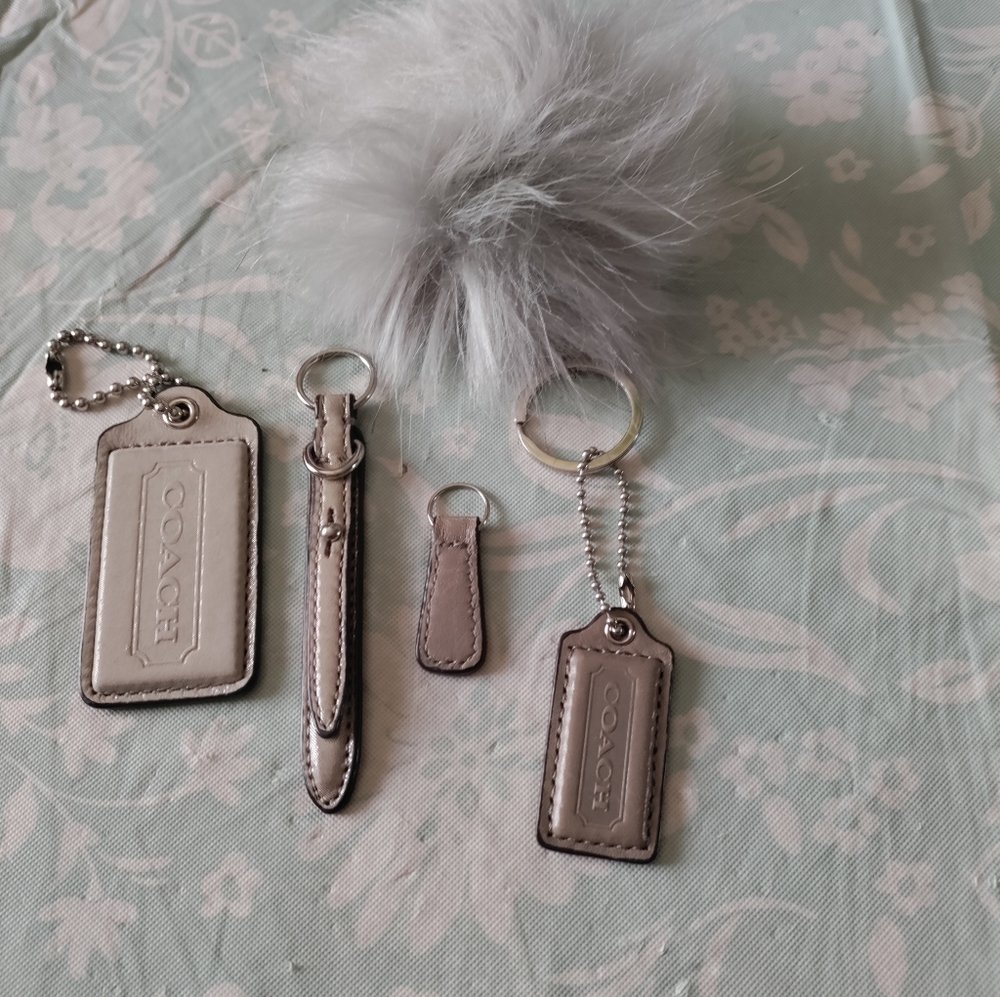 Coach Metallic Silver Keychain Set with Fluffy Pom Pom
